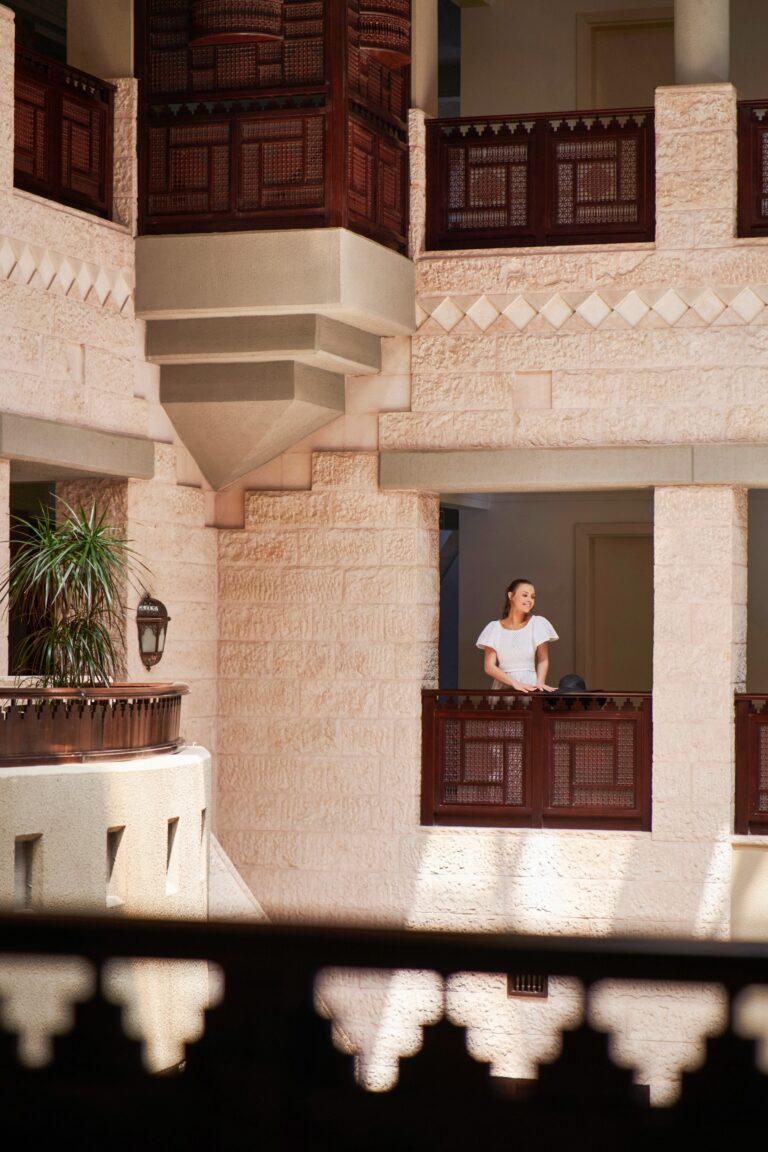Resort courtyard with carved wooden balconies, Mövenpick Resort Petra