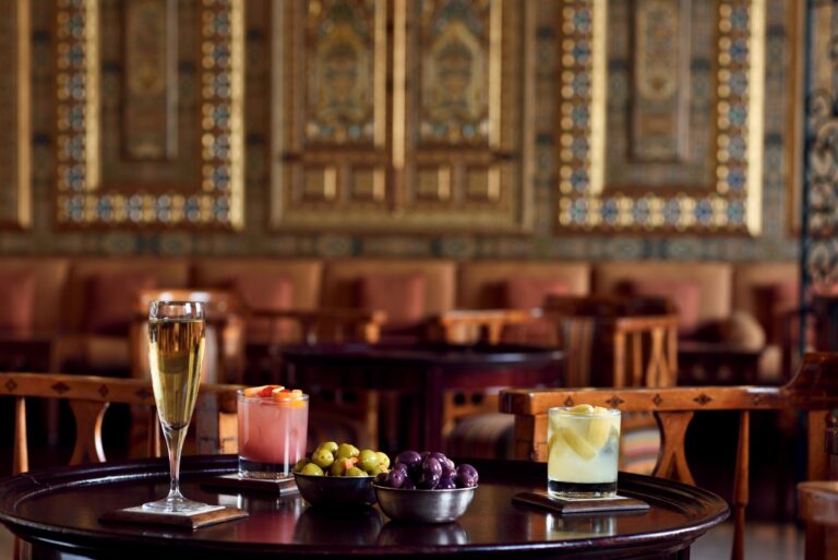 Drinks in the bar lounge with carved panelling, Mövenpick Resort Petra