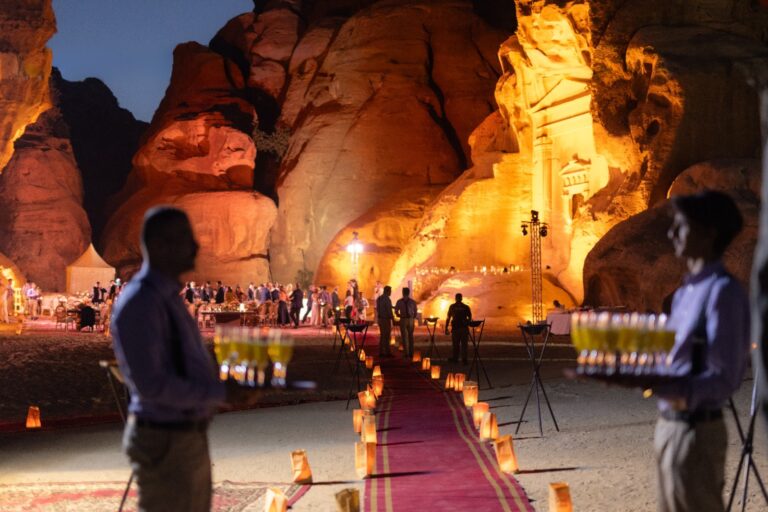 Welcome drinks served along a lantern-lined carpet, Mövenpick Resort Petra