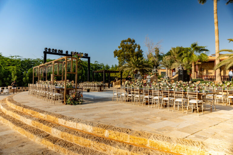 Stage and long tables on the stepped stone terrace, Mövenpick Resort & Spa Dead Sea