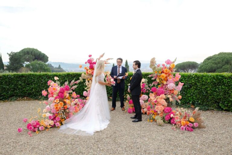 The ceremony seen from behind, hedges and the hills of Florence beyond, Magnolia Wedding Planner