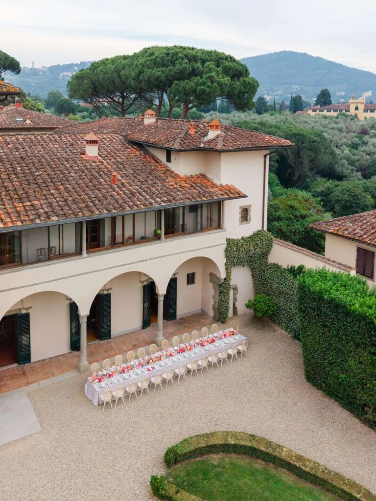 The arcaded loggia with tables laid along the box hedges, Magnolia Wedding Planner