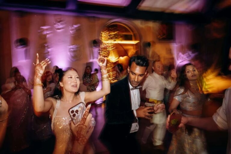 The dance floor under coloured light, the party at full volume, Magnolia Wedding Planner