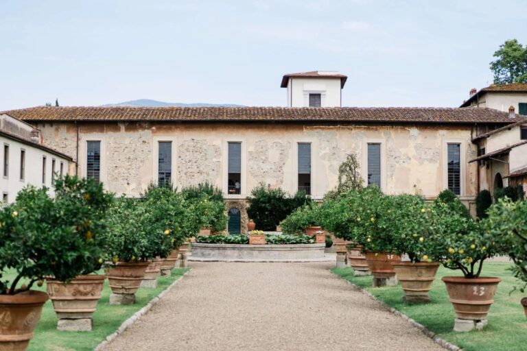 A villa facade and its citrus garden, lemon pots down the gravel, Magnolia Wedding Planner