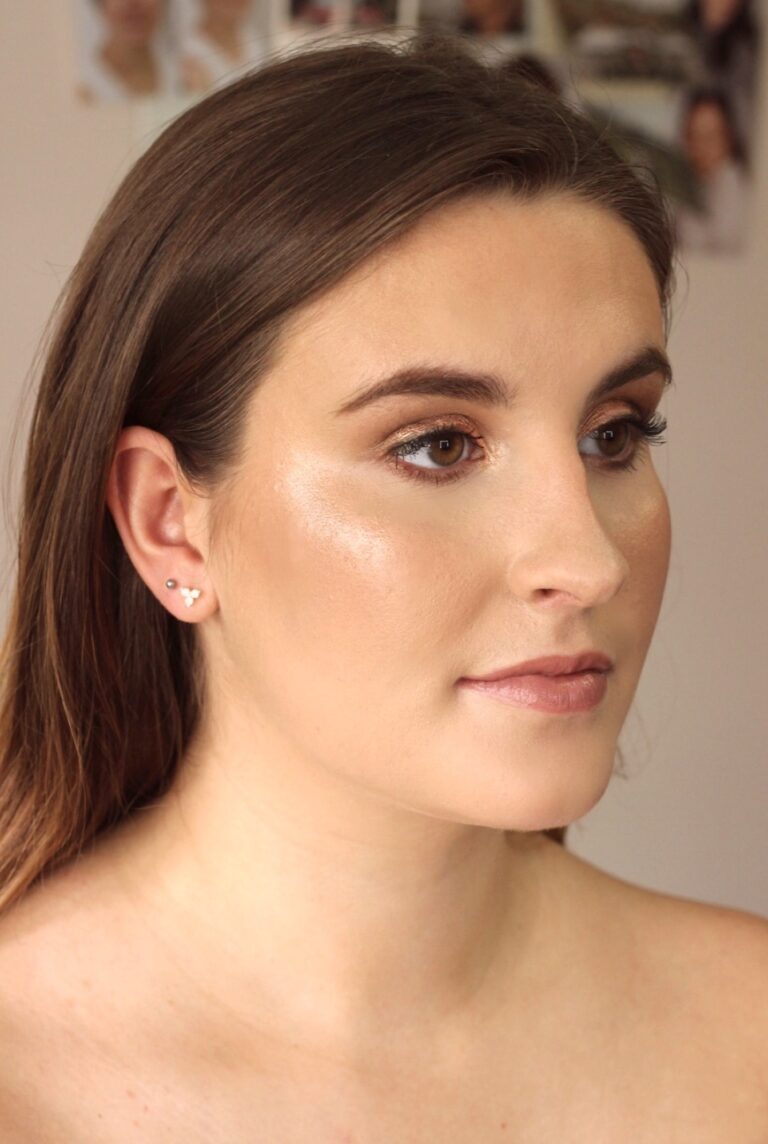 A woman in profile, dark waved hair, soft glam makeup, Makeup By Becky Flynn
