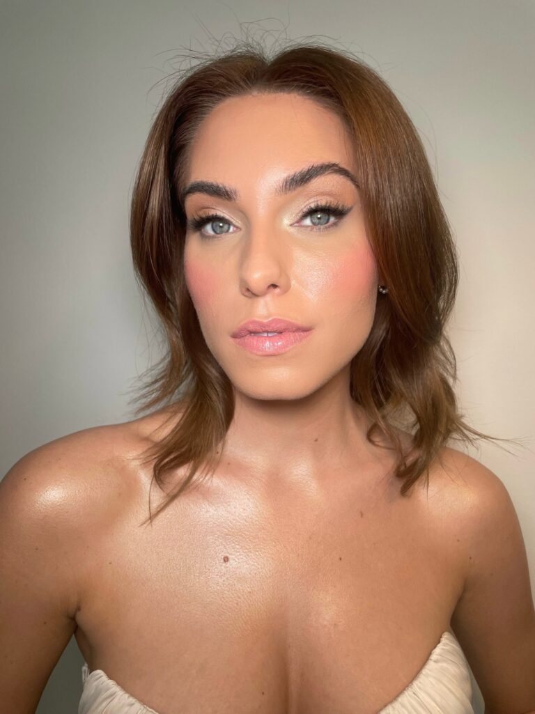 A close beauty portrait, sun-kissed dewy skin, dark hair, Makeup By Becky Flynn