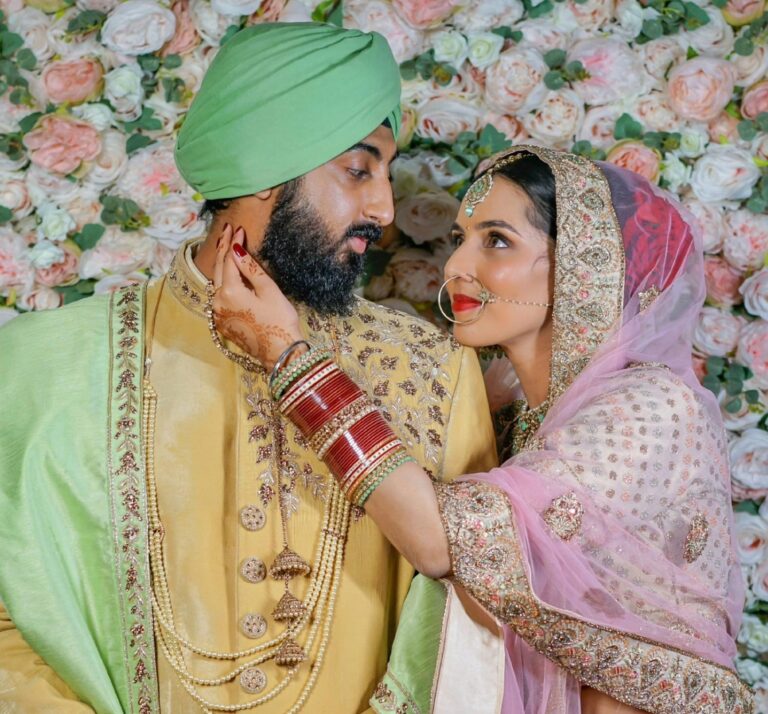 A Sikh bride and groom, a close portrait, hennaed hands, Makeup By Mirna