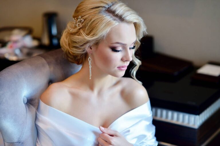 A bride's portrait, off-shoulder satin, a hotel suite behind her, Makeup By Mirna
