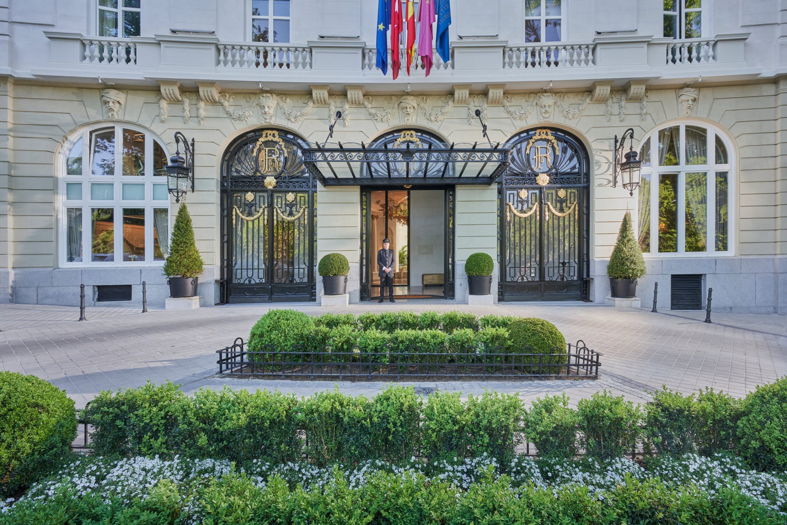 The hotel entrance and facade on Plaza de la Lealtad, Mandarin Oriental Ritz Madrid