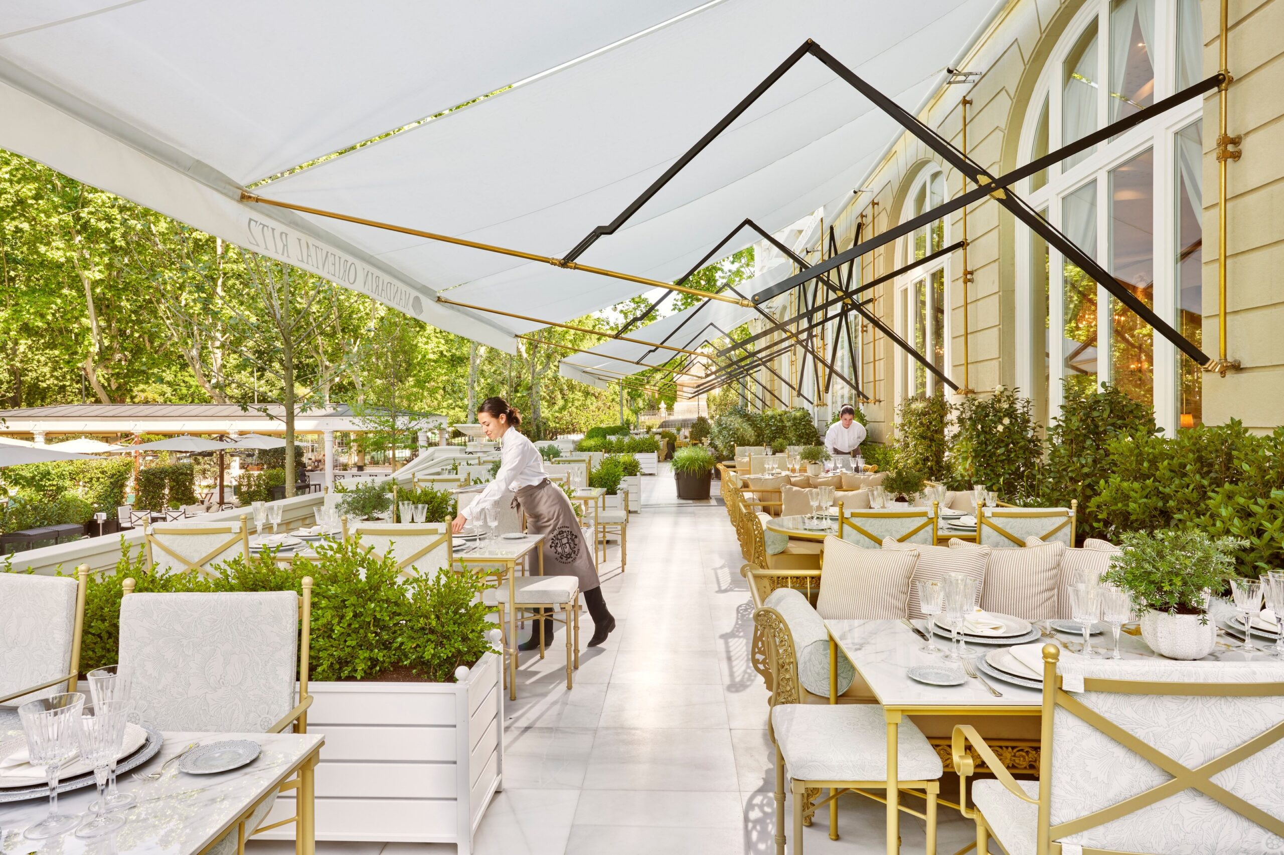 Garden terrace tables set for lunch, Mandarin Oriental Ritz Madrid