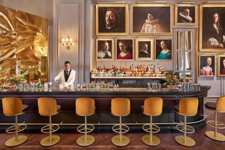 Pictura bar with framed portraits behind it, Mandarin Oriental Ritz Madrid