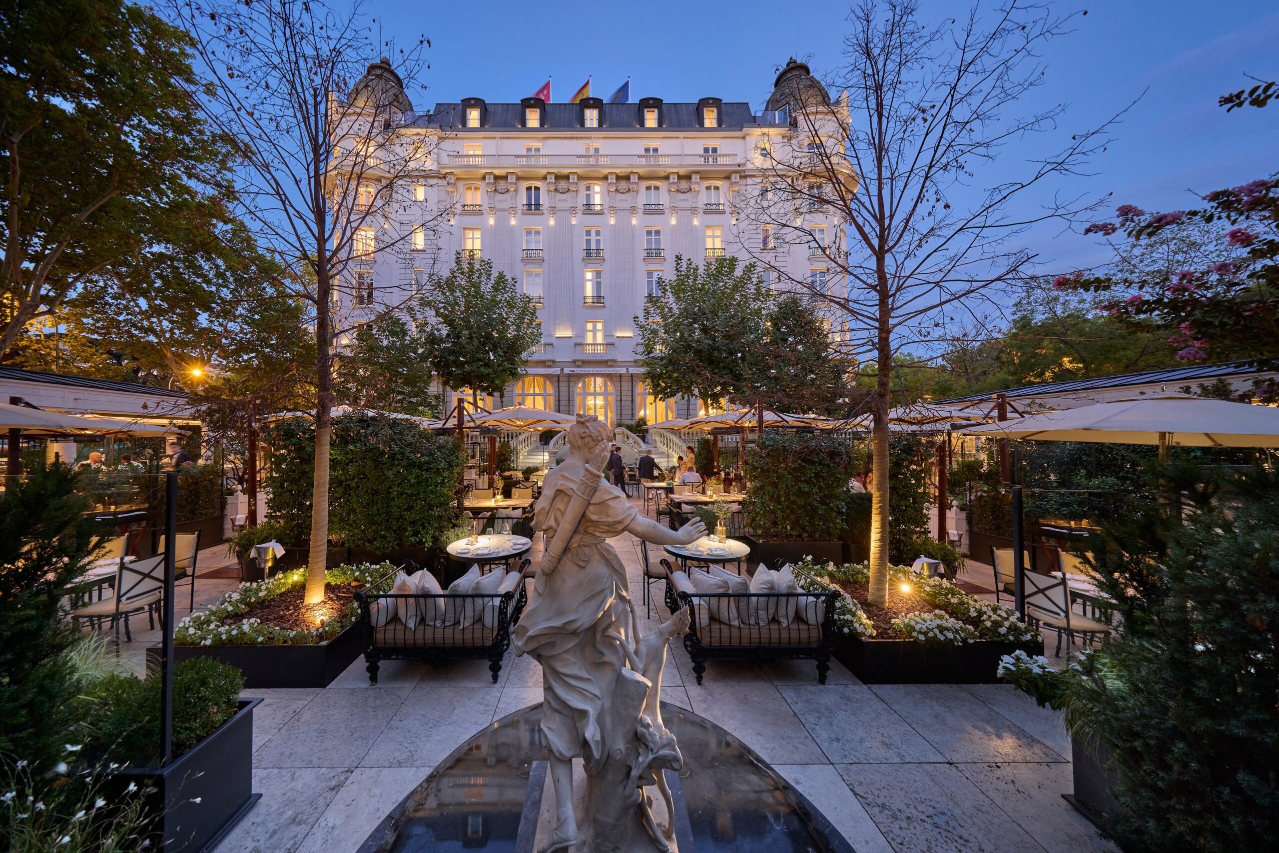 The Ritz Garden and the hotel at dusk, Mandarin Oriental Ritz Madrid
