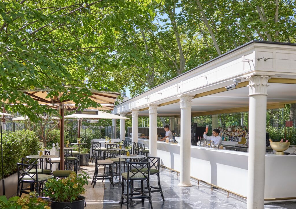 The garden pavilion and tables among the trees, Mandarin Oriental Ritz Madrid