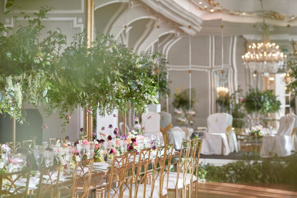 Ballroom decorated with greenery for a wedding dinner, Mandarin Oriental Ritz Madrid