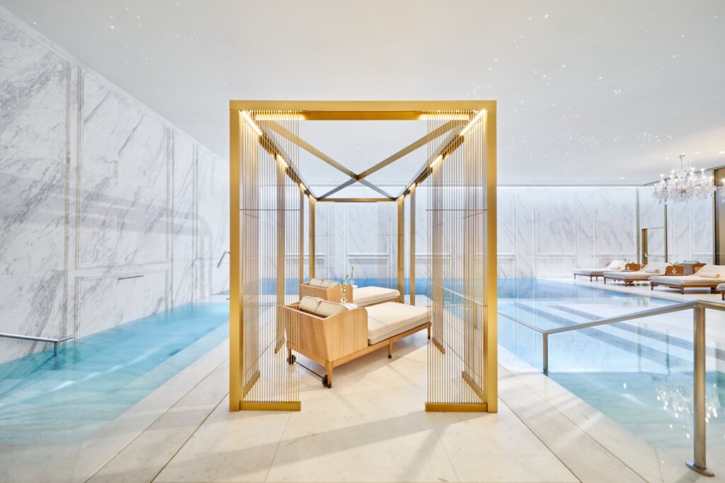 Indoor pool with a gold-framed daybed, Mandarin Oriental Ritz Madrid