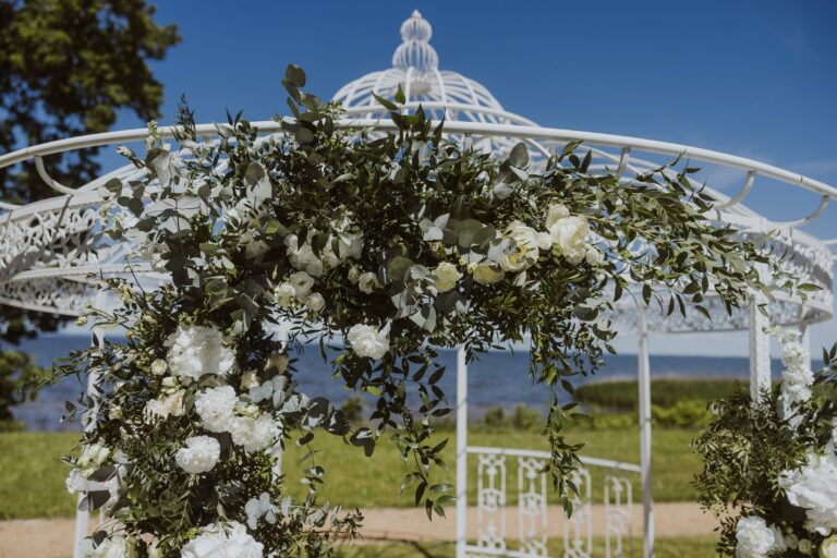 Wedding gazebo dressed with greenery and white flowers, Manowce Palace