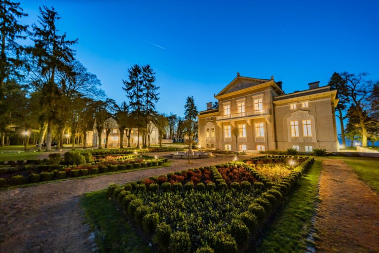Palace and garden parterre at dusk, Manowce Palace