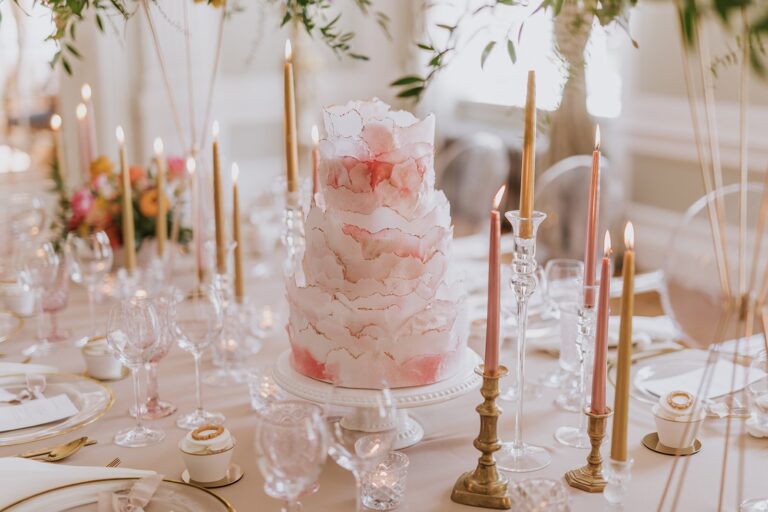 Wedding cake among candles and glassware, Manowce Palace