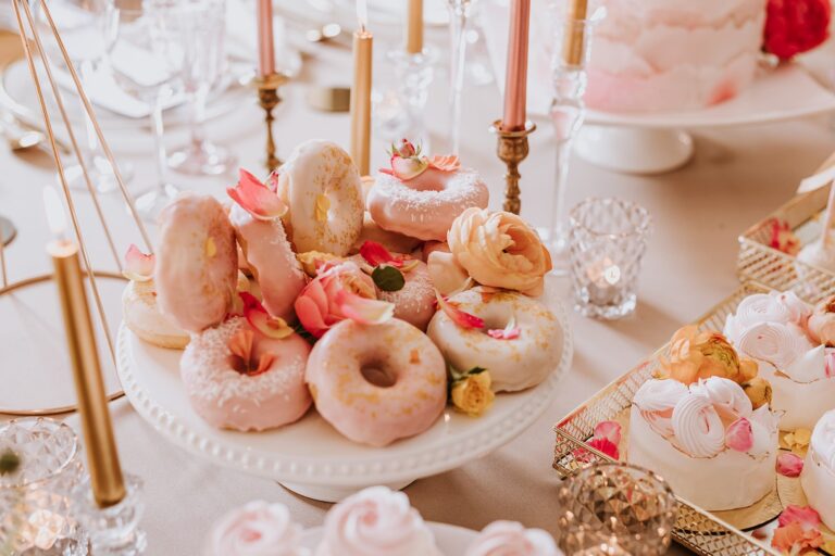 Dessert table with doughnuts and pastries, Manowce Palace