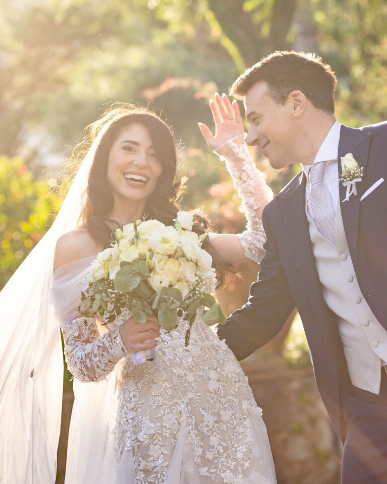 Golden-hour portrait of the bride with her bouquet, Marco Ficili