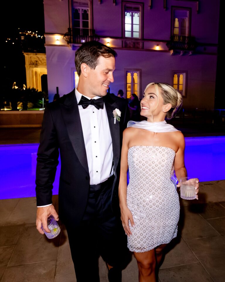 The newlyweds at a poolside reception in the evening, Marco Ficili