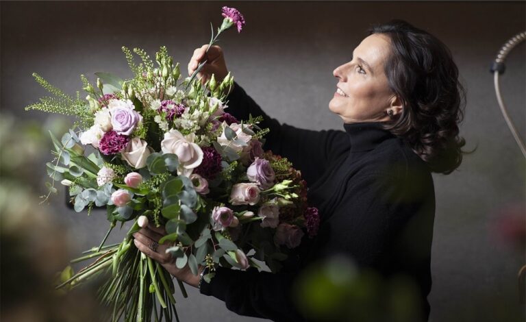 Maria Luisa Rocchi at work on a bridal bouquet, her Rome studio, Maria Luisa Rocchi Flowers