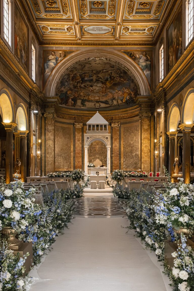 A garland of white rose beneath a gilded coffered ceiling, Maria Luisa Rocchi Flowers