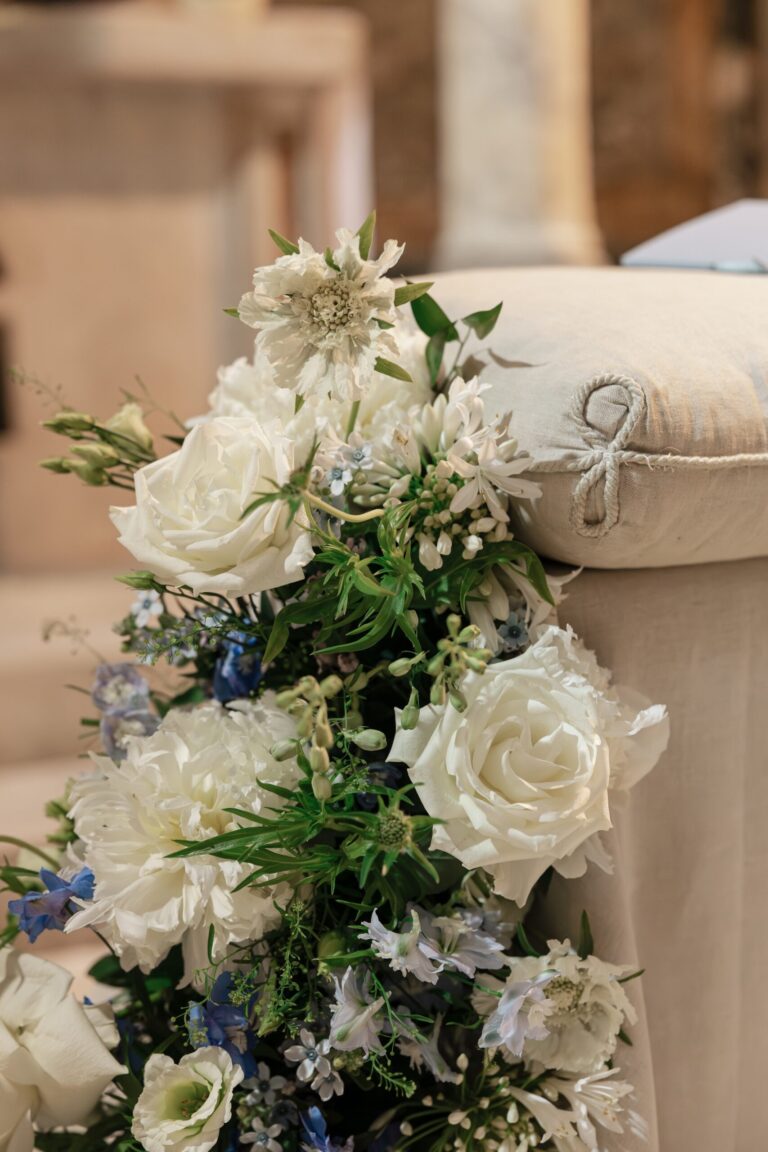 A pew posy of white rose, scabiosa and blue delphinium, Maria Luisa Rocchi Flowers