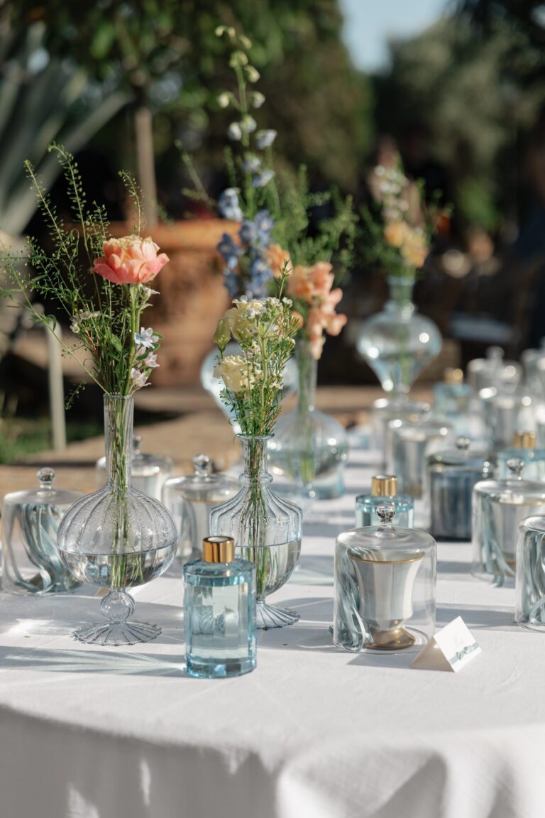 A row of bud vases in pastel wildflowers, cocktail hour, Maria Luisa Rocchi Flowers