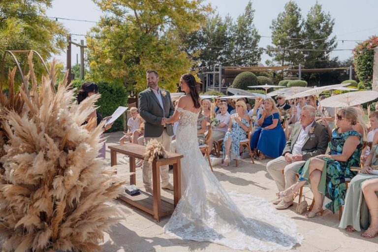 Outdoor ceremony with guests and pampas styling at Liopetro, Kouklia, Marry Me Cyprus