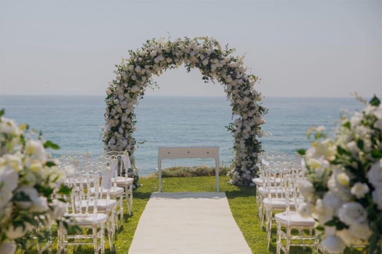 Floral arch and aisle facing the sea at Alassos, Paphos, Marry Me Cyprus