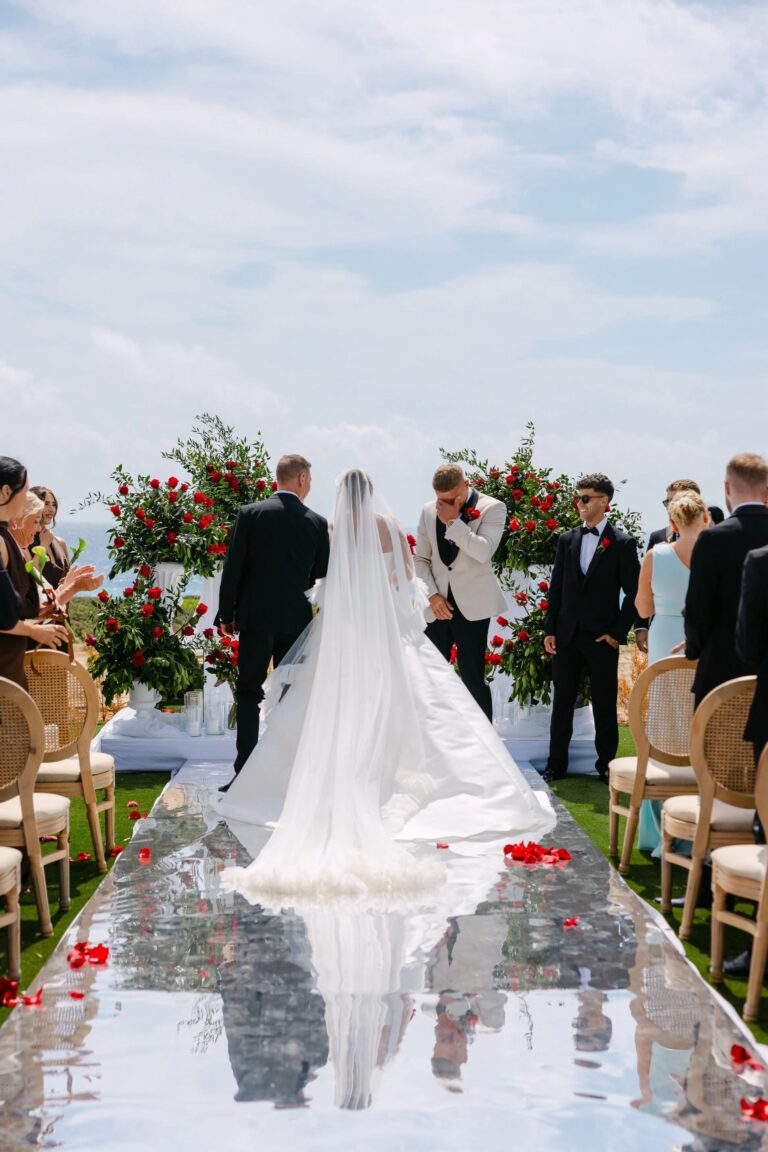 Bride walking the mirrored aisle at OZEA, Sea Caves, Paphos, Marry Me Cyprus