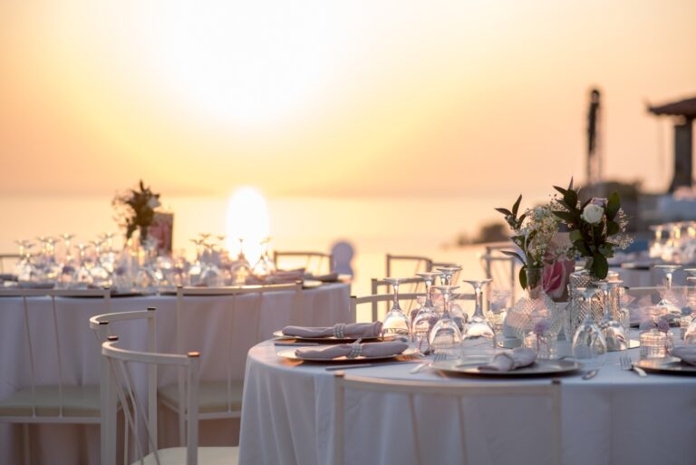 Dinner tables set for the reception at sunset, Marryme in Greece