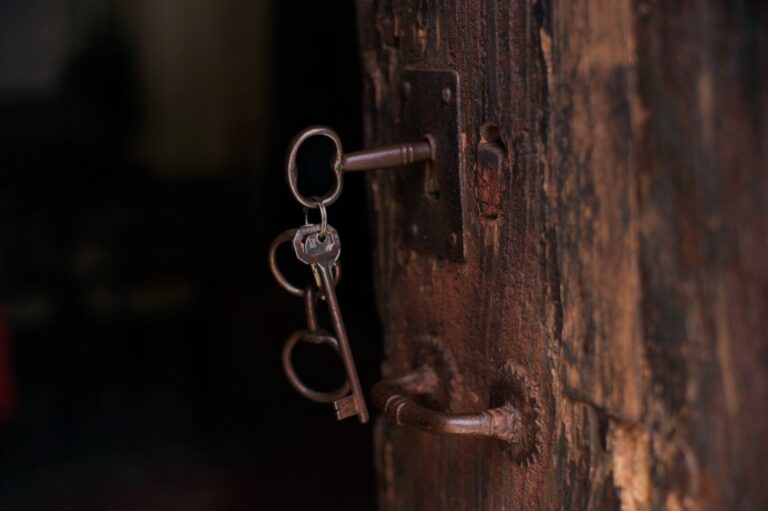 Old keys in a wooden door of the masseria, Masseria Spina Resort