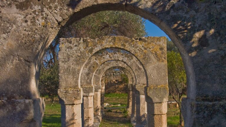 Stone arches in the park, Masseria Spina Resort