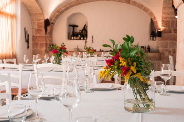 The Sala Colonna restaurant laid for dinner, Masseria Spina Resort