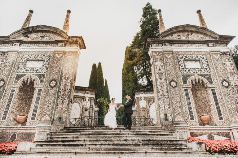 A couple at the foot of the mosaic nymphaeum steps at Villa d'Este, Cernobbio, Matteo Cuzzola Photography