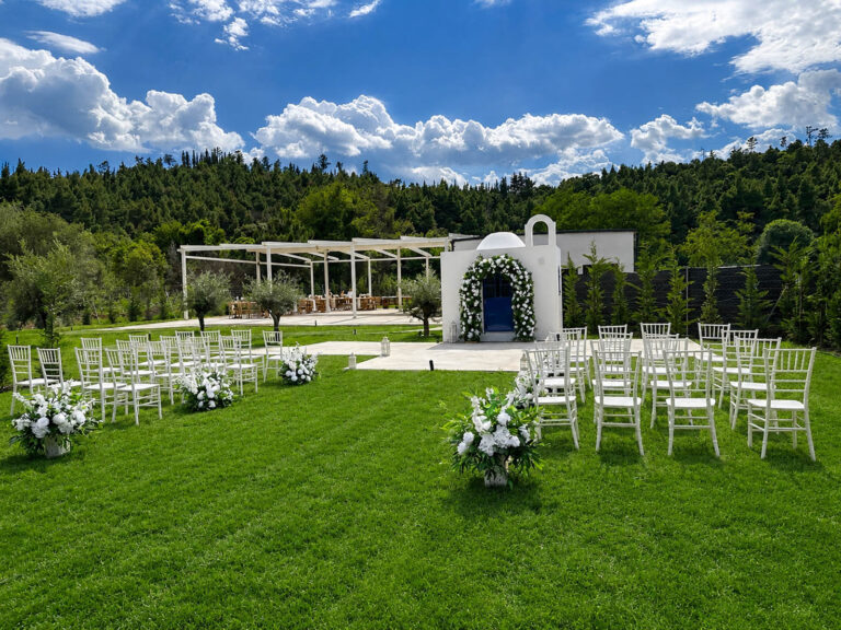 Lawn ceremony beside the white chapel, Mazal Weddings