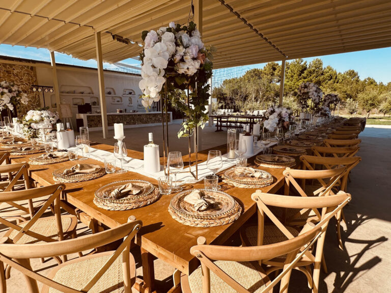 Reception tables under the covered terrace, Mazal Weddings