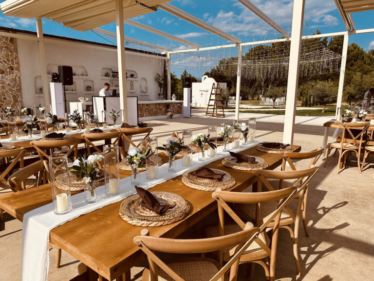 Reception terrace laid for dinner, Mazal Weddings