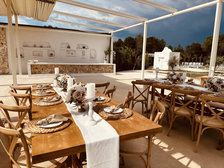 Reception tables beneath the pergola, Mazal Weddings