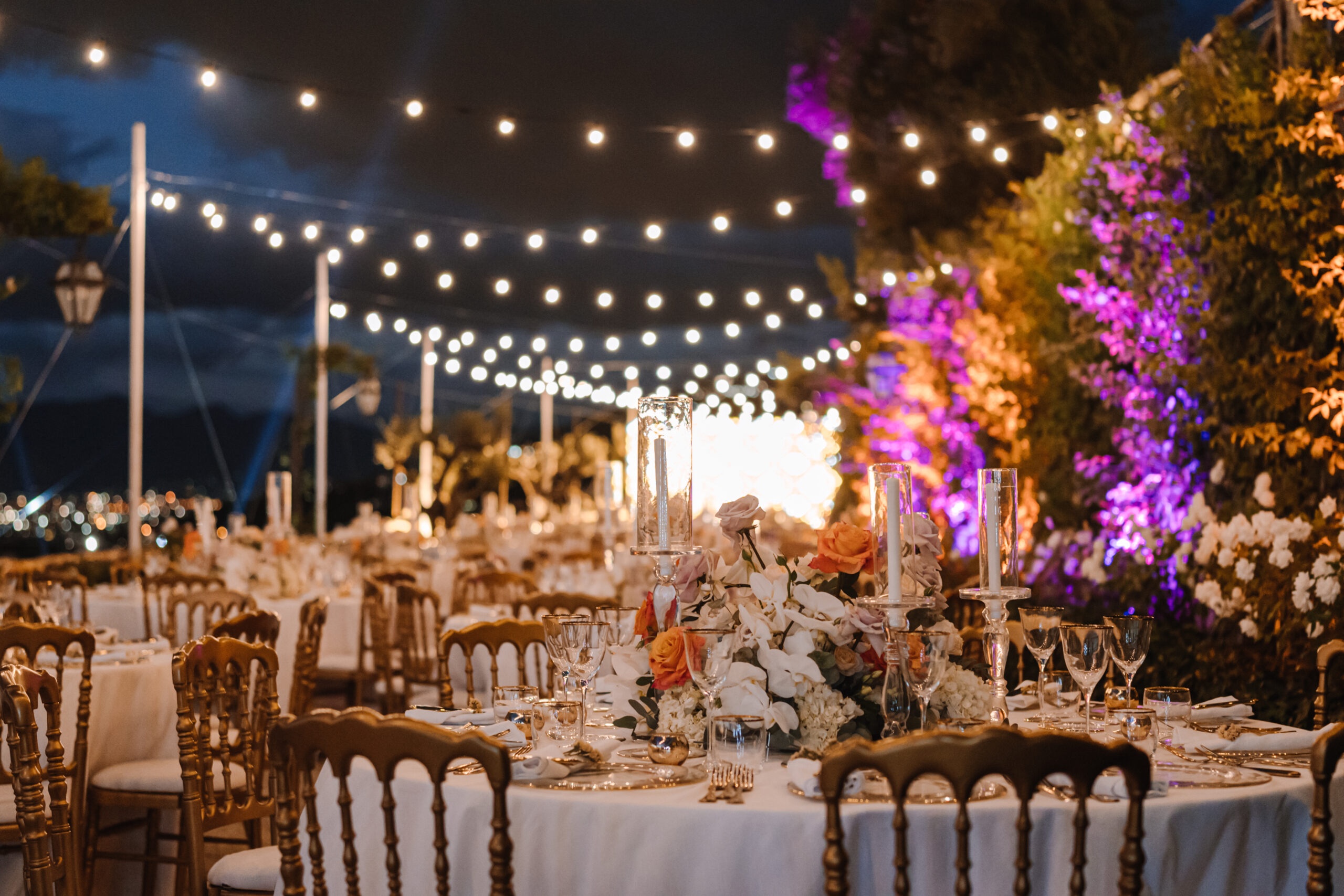 Dusk under festoon lights at a masseria in Campania, Meissa Eventi