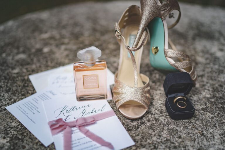 Bridal details: gold sandals, perfume, the rings and the wedding stationery, Michele Monasta Photography
