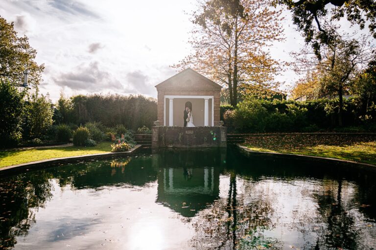 The Temple across the pond at dusk in autumn, Micklefield Hall