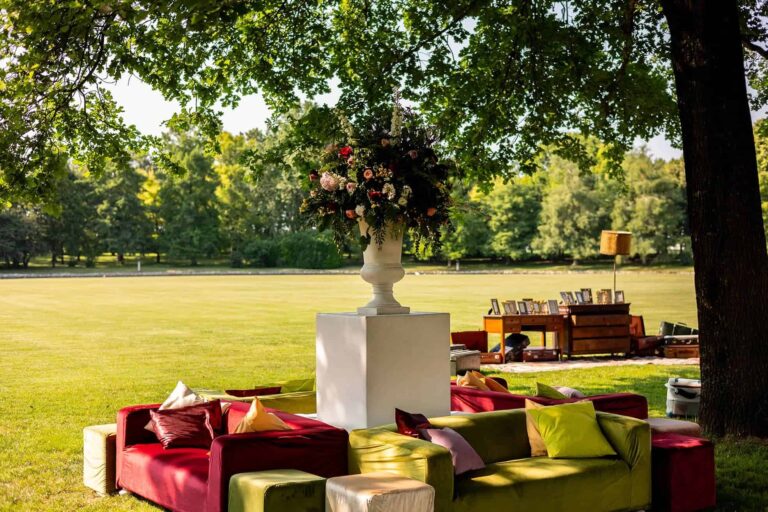 Velvet lounge seating in red and lime set out in the park, Mirko Zago, Sparkling Weddings and Events