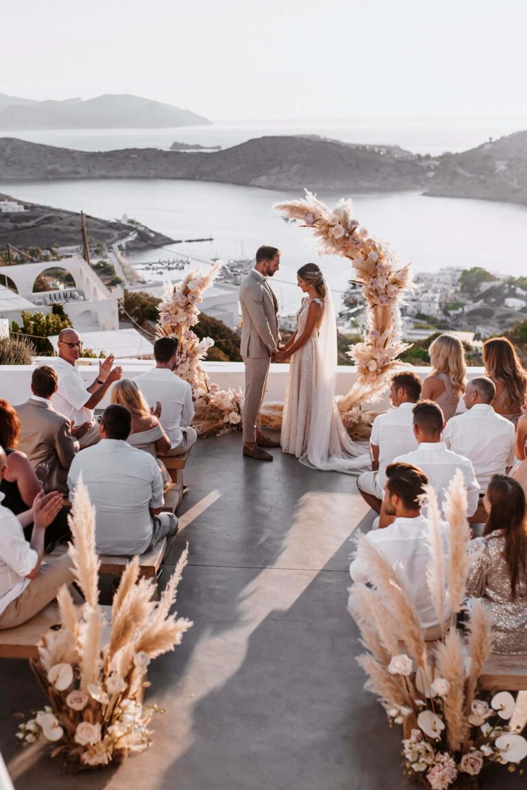 Ceremony with dried floral arrangements above the bay on Ios, Mitheo Events