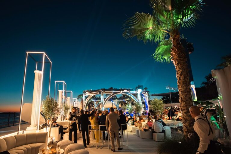 Evening cocktail terrace with lit installations on the Athens Riviera, Mitheo Events