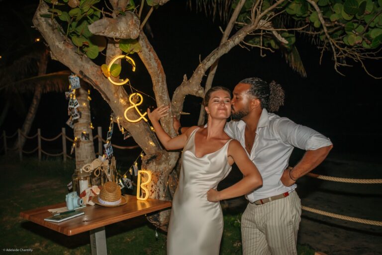 A couple at night beside a tree hung with illuminated initials, Myl'Evasions