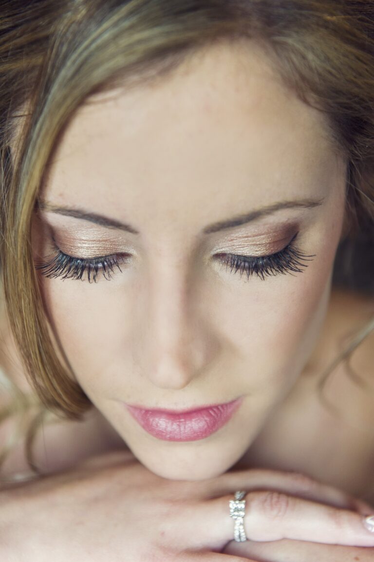 A close bridal portrait, lashes and a diamond ring in soft focus, Nadine Pyke Make Up Artist