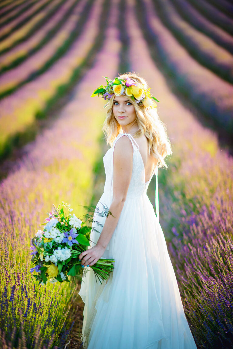 A bride in a Naomi Neoh gown in a lavender field, Lavender Lust styled shoot